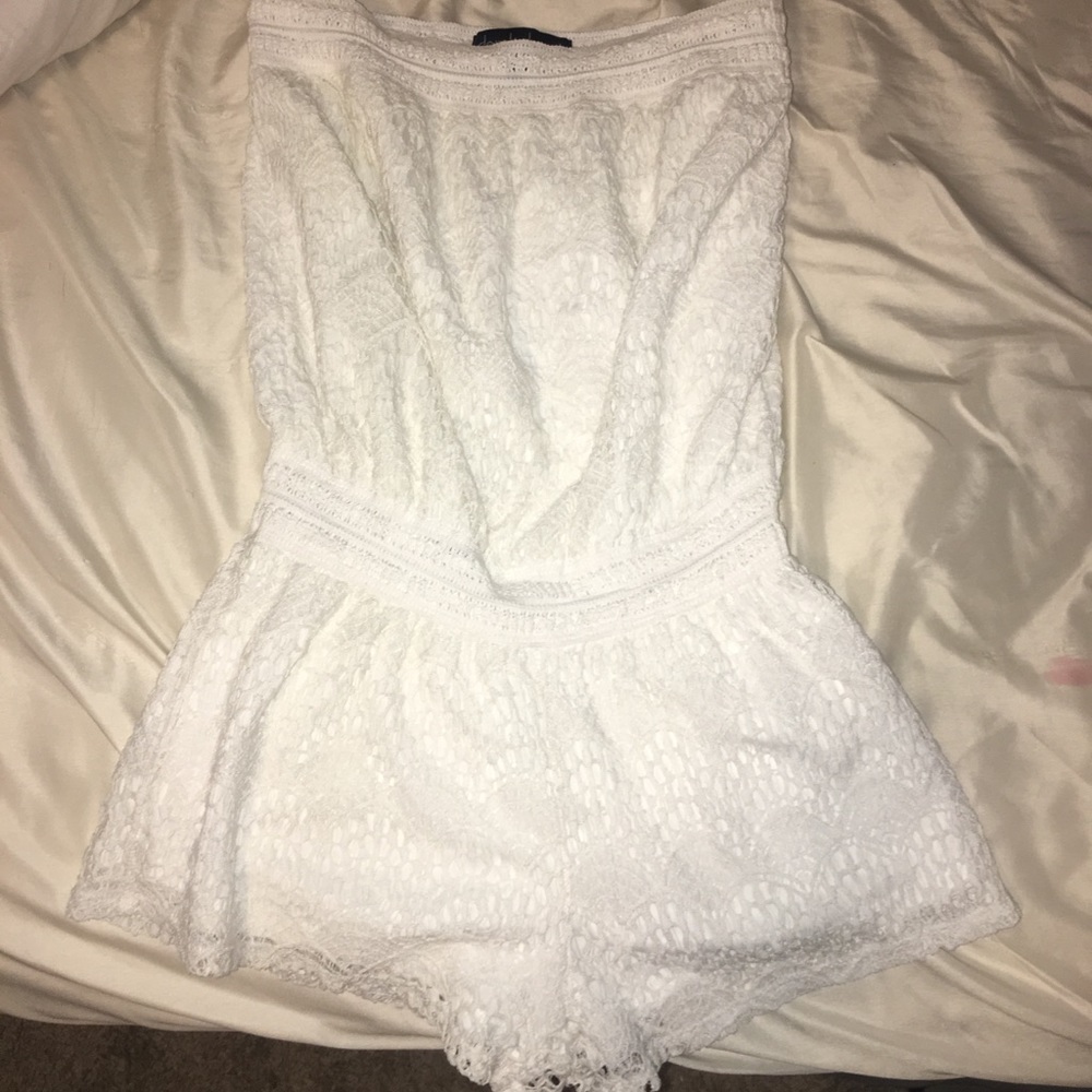 white sleeveless romper
